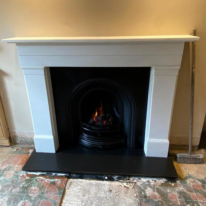 White marble "Charlotte" mantel, "Better Hearth Arch" insert, gas fire